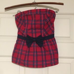 Cute plaid and pleated top!